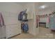 Walk-in closet features ample storage space, shelving, and an organized layout at 15216 Shallow Ridge Rd, Charlotte, NC 28278
