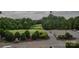Scenic view of a lush green golf course surrounded by trees at 15216 Shallow Ridge Rd, Charlotte, NC 28278