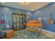 Cozy living room featuring a piano, guitars and eclectic decor at 15216 Shallow Ridge Rd, Charlotte, NC 28278