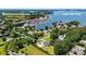 Stunning aerial view of waterfront property with close proximity to Waterstreet Marina and Lake Norman at 18745 Bluff Point Rd, Cornelius, NC 28031
