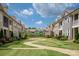 Townhome community features landscaped courtyards and walkways at 20216 Shaffer Bach Ln, Charlotte, NC 28277