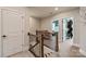 Upstairs hallway with neutral walls and carpet shows access to various rooms at 20216 Shaffer Bach Ln, Charlotte, NC 28277