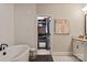 Bathroom area with walk-in closet providing organized storage solutions at 20216 Shaffer Bach Ln, Charlotte, NC 28277