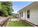 Fenced backyard with a patio providing a private outdoor space for relaxation and entertainment at 207 Crystal Springs Ln, Shelby, NC 28150
