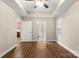 Bedroom with hardwood floors, ceiling fan, and neutral colored walls at 207 Crystal Springs Ln, Shelby, NC 28150