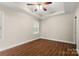 Bedroom with a ceiling fan, hardwood floors and neutral paint at 207 Crystal Springs Ln, Shelby, NC 28150