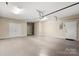 Spacious garage featuring multiple doors and high ceilings at 207 Crystal Springs Ln, Shelby, NC 28150