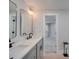 Elegant bathroom with double sinks, updated fixtures, and neutral palette at 2143 Manawa Ln, Tega Cay, SC 29708