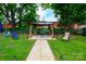 Landscaped backyard features an outdoor gazebo, perfect for entertaining at 224 E Steele St, Salisbury, NC 28144