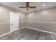 Bedroom featuring stylish ceiling fan and wood-look floors at 224 E Steele St, Salisbury, NC 28144
