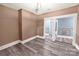 Spacious living room features wood-look floors and neutral paint scheme at 224 E Steele St, Salisbury, NC 28144