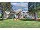 Charming exterior with manicured lawn, stylish stone accents, and a welcoming front porch at 2270 New Gray Rock Rd, Fort Mill, SC 29708