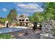 Gated driveway leads to a stunning white home with a three-car garage at 2270 New Gray Rock Rd, Fort Mill, SC 29708