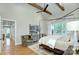 Bedroom features wood beams, hardwood floors, canopy bed, natural light and comfortable seating at 2270 New Gray Rock Rd, Fort Mill, SC 29708