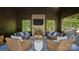 Comfortable covered outdoor living area with brick fireplace and outdoor kitchen at 2270 New Gray Rock Rd, Fort Mill, SC 29708