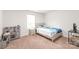 bedroom featuring carpet, a bed and a play kitchen at 2340 Lanza Dr, Charlotte, NC 28215