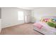 Comfortable bedroom featuring carpet, a dresser, and an open window at 2340 Lanza Dr, Charlotte, NC 28215