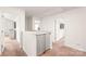 Upstairs hallway featuring modern carpeting and a safety gate at 2340 Lanza Dr, Charlotte, NC 28215
