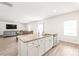 Open kitchen with a breakfast bar overlooking the living and dining areas, perfect for entertaining at 2340 Lanza Dr, Charlotte, NC 28215