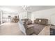 Open-concept living space blending living room, dining area, and modern kitchen seamlessly at 2340 Lanza Dr, Charlotte, NC 28215