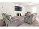 Spacious living room with wood floors, neutral walls, and comfortable seating area at 2340 Lanza Dr, Charlotte, NC 28215