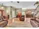 Open concept living room flows into the kitchen with hardwood floors and a neutral color palette at 267 Ikerd Se Dr, Concord, NC 28025