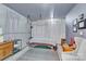 Unfinished basement featuring finished flooring and curtains at 267 Ikerd Se Dr, Concord, NC 28025