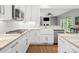 Stylish kitchen with a farmhouse sink, stainless appliances, and white subway tile backsplash at 2821 Providence Spring Ln, Charlotte, NC 28270