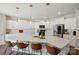 Bright kitchen featuring white cabinets, a large center island with seating, and stainless steel appliances at 3471 Melwood Estates Dr, Denver, NC 28037