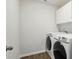 Clean, bright laundry room featuring a modern washer and dryer at 3471 Melwood Estates Dr, Denver, NC 28037