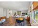 Open floor plan showcases a modern living space connected to the dining area and kitchen at 3471 Melwood Estates Dr, Denver, NC 28037