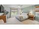 Bright main bedroom with a king bed, neutral colors, a ceiling fan and lots of natural light at 3471 Melwood Estates Dr, Denver, NC 28037