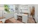 Bright home office with large window, modern desk, and stylish decor at 3471 Melwood Estates Dr, Denver, NC 28037