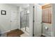 Modern shower with glass door, gray tile, and modern fixtures at 3471 Melwood Estates Dr, Denver, NC 28037