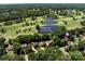 Scenic aerial shot of Cedarwood Country Club homes nestled among the trees and golf course at 3531 Bon Rea Dr, Charlotte, NC 28226