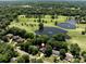 Stunning aerial view of the property overlooking a lush golf course and tranquil lakes at 3531 Bon Rea Dr, Charlotte, NC 28226