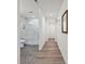 Bright bathroom featuring a large glass-enclosed shower with white subway tile and neutral colored flooring at 3531 Bon Rea Dr, Charlotte, NC 28226