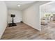 Bright and airy bonus room featuring neutral paint, plank flooring and lots of natural light at 3531 Bon Rea Dr, Charlotte, NC 28226