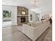 Bright living room with stone fireplace, comfortable seating, and a view of the yard at 3531 Bon Rea Dr, Charlotte, NC 28226