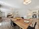 Open concept living space with modern kitchen, dining area, and comfortable lounge seating at 3531 Bon Rea Dr, Charlotte, NC 28226