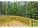 Wood deck overlooks a private, wooded backyard at 501 Old Speedway Nw Dr # 1, Concord, NC 28027