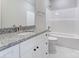 Bathroom featuring granite countertops, white cabinets and a shower and tub at 501 Old Speedway Nw Dr # 1, Concord, NC 28027