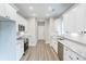 Modern kitchen featuring stainless steel appliances, granite countertops, and ample cabinet space at 501 Old Speedway Nw Dr # 1, Concord, NC 28027