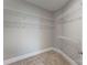 Walk-in closet with carpet and wire shelving at 501 Old Speedway Nw Dr # 1, Concord, NC 28027