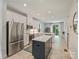 Contemporary kitchen with stainless steel appliances, an island, and lots of storage at 513 Cubitt Ct, Charlotte, NC 28205