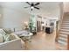 Open concept living space connects living room, kitchen, and staircase at 513 Cubitt Ct, Charlotte, NC 28205