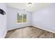 Bedroom with hard wood floors, neutral paint and lots of natural light at 522 Klondike Ln, Charlotte, NC 28216
