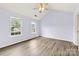 Spacious bedroom featuring ample natural light, hard wood floors and neutral walls at 522 Klondike Ln, Charlotte, NC 28216