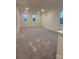 Spacious bedroom with plush carpeting and ample natural light from three windows at 5239 Scotts Creek Rd, Indian Land, SC 29707
