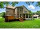 Beautiful backyard with a large deck and covered patio, offering ample space for outdoor enjoyment at 6324 Old Fox Hunt Ln, Mint Hill, NC 28227